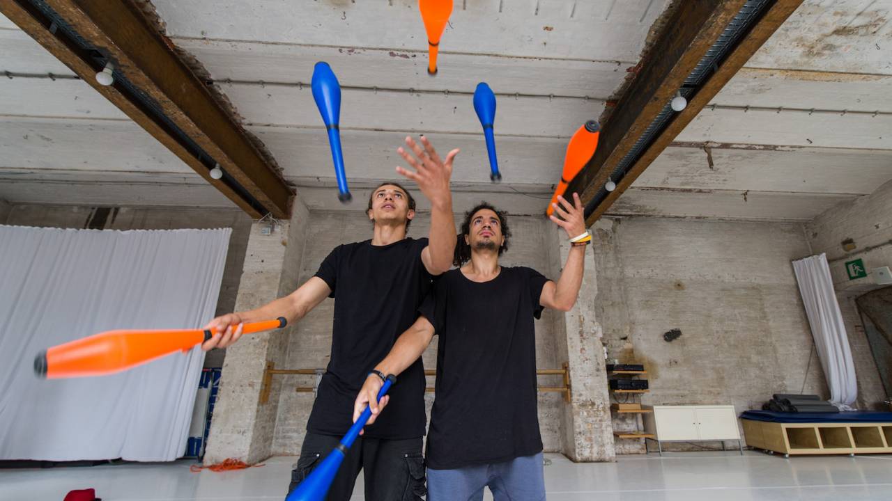 Mohamed and Khaled showing off their juggling skills