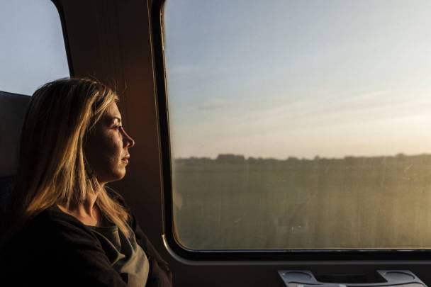 Lilas Hatahet, a Syrian refugee, journalist and separated mother of two boys, sits on the train on her way back home after finishing her work day in Copenhagen where she’s working as a Media Advisor.