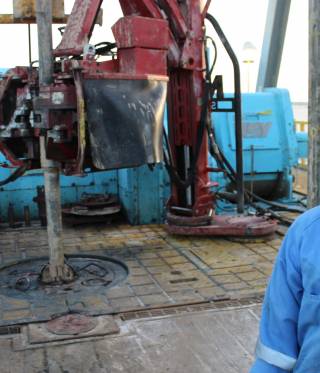 File photo: An oil worker in the south of Libya photographed in 2014. 