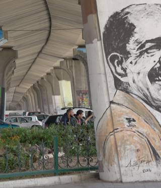 A mural of Chokri Belaid, a politician assassinated in 2013.